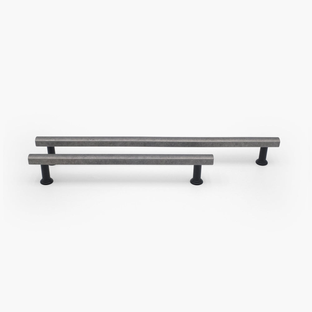 12" and 18" Mod appliance pulls in Weathered Nickel and Matte Black standing on white background