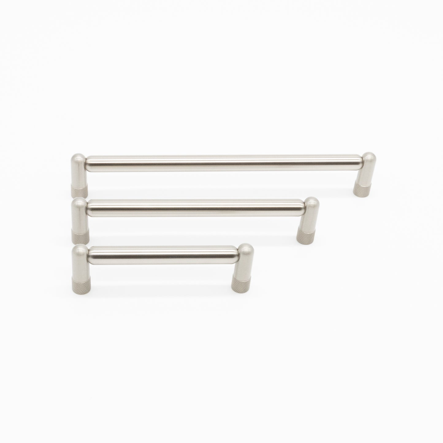 three sizes satin nickel silver knurled pulls on white background