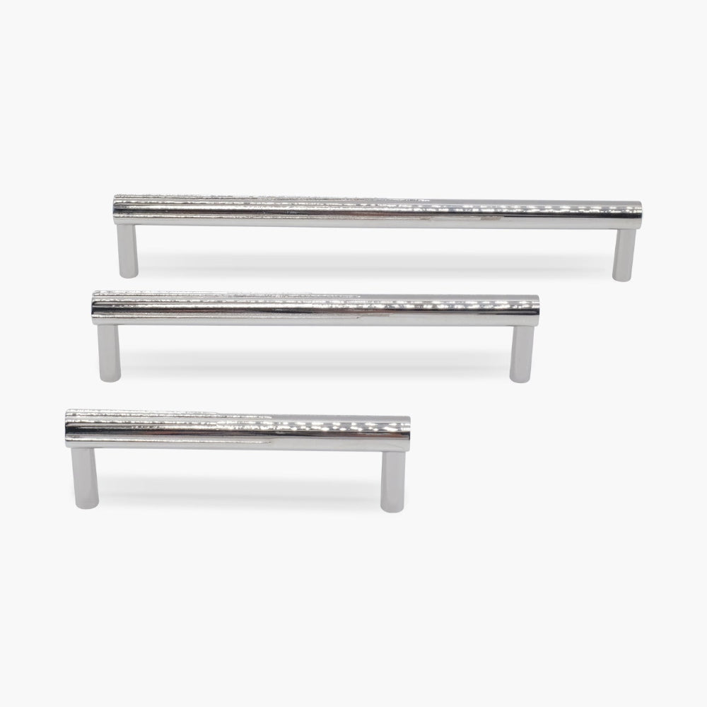 three sunburst polished nickel cabinet pulls in three sizes on white background