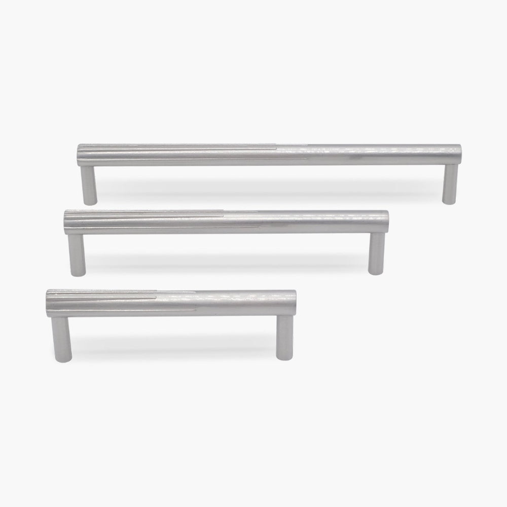 Three sunburst silver satin nickel cabinet pulls in three different sizes on white background