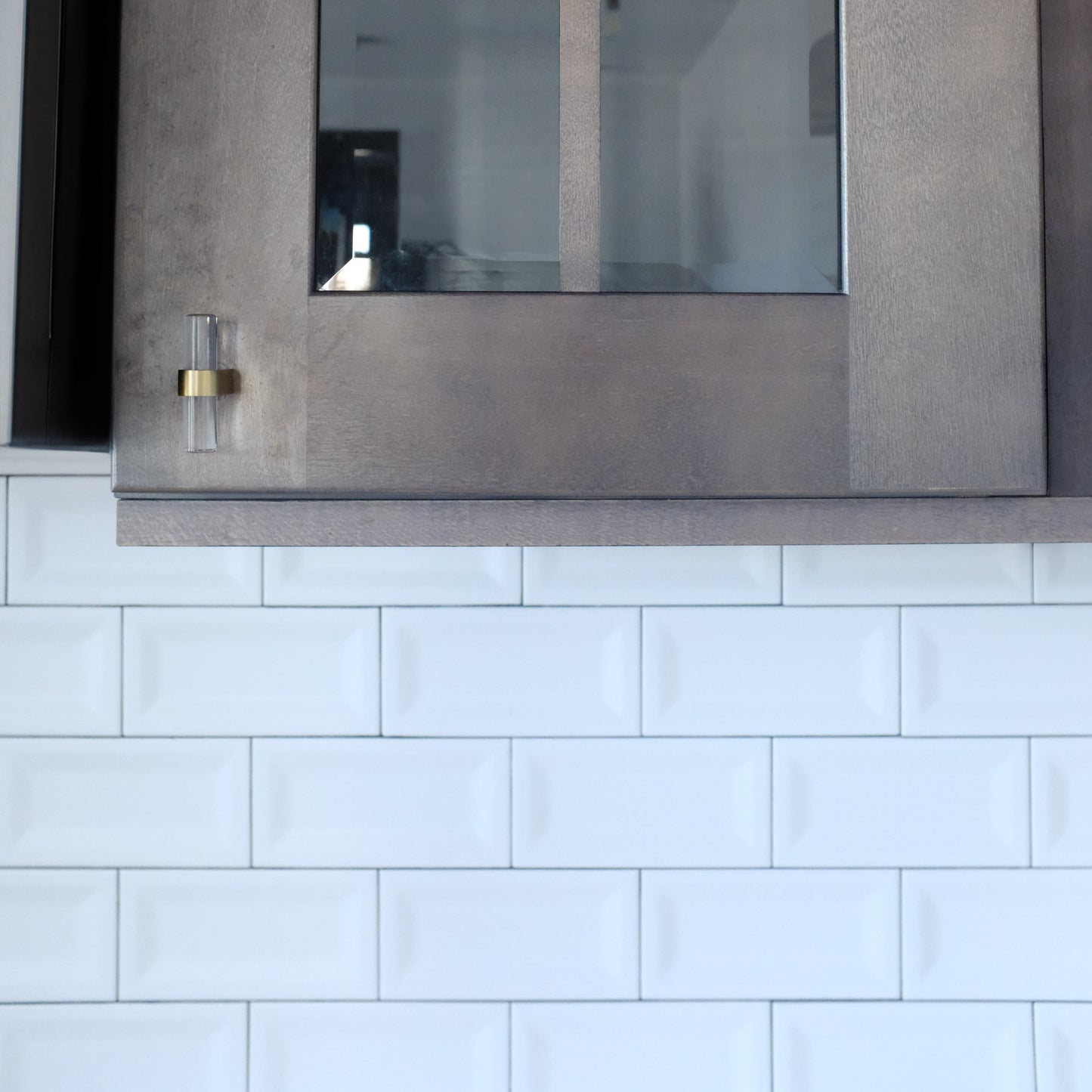 Satin Brass Acrylic Knob on Brown Kitchen Cabinets