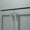 Angled view of two Satin Nickel Hapny Horizon knobs installed on blue cabinet doors