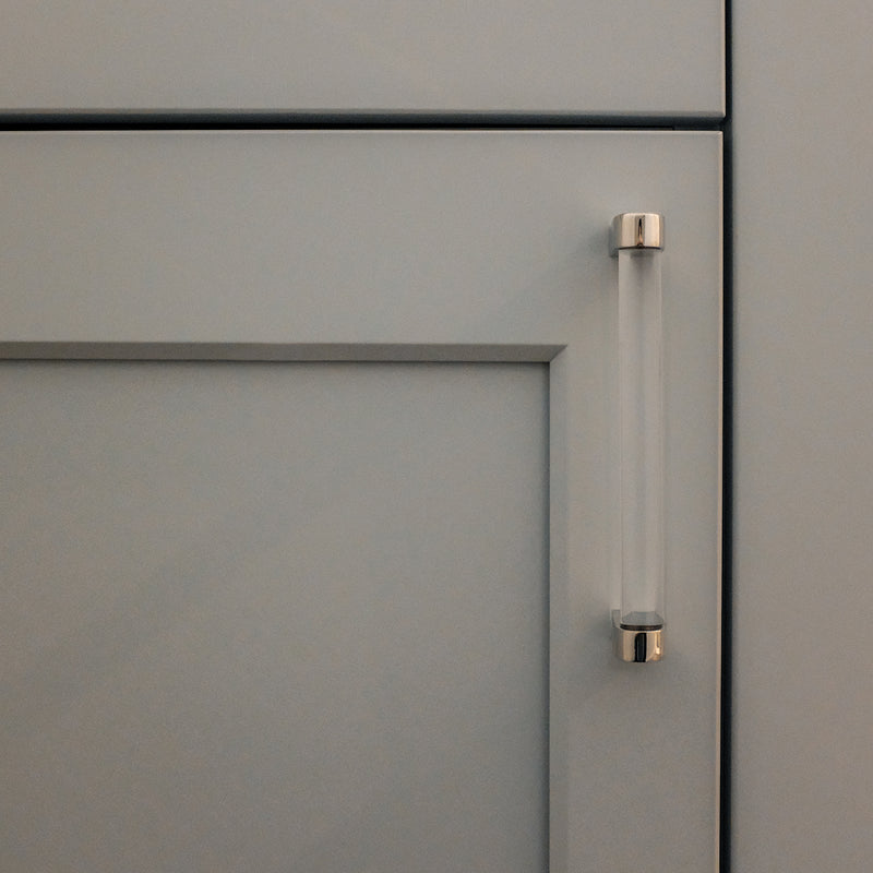 Acrylic Kitchen Handle in Satin Brass on a Blue Shaker cabinet. 