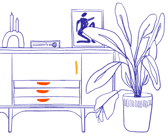 Illustration of a console with one yellow and three red Hapny cabinet pulls, as well as a candle, radio, framed sketch, and birds of paradise plant.
