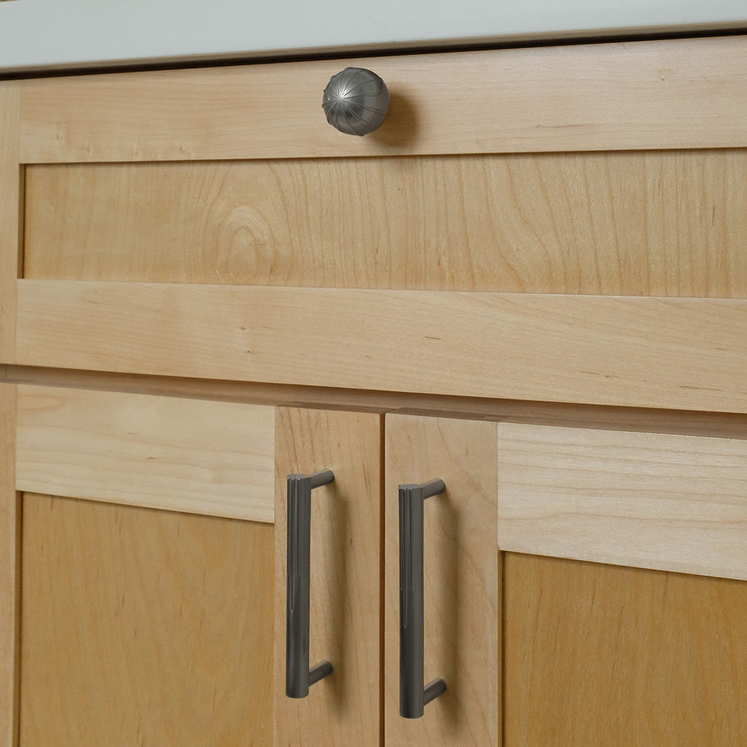 Nickel Cabinet Hardware on Wooden Bathroom Vanity in the Sunburst Collection