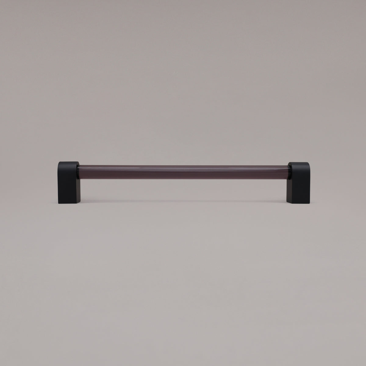 Clarity smoke acrylic and matte black stems 12 inch appliance pull standing on gray background