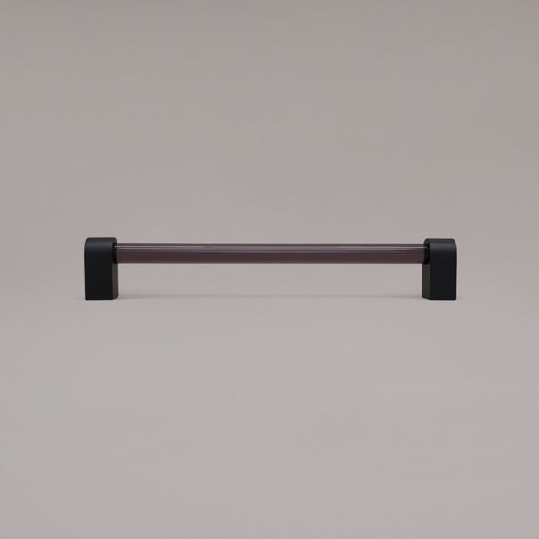 Clarity smoke acrylic and matte black stems 12 inch appliance pull standing on gray background
