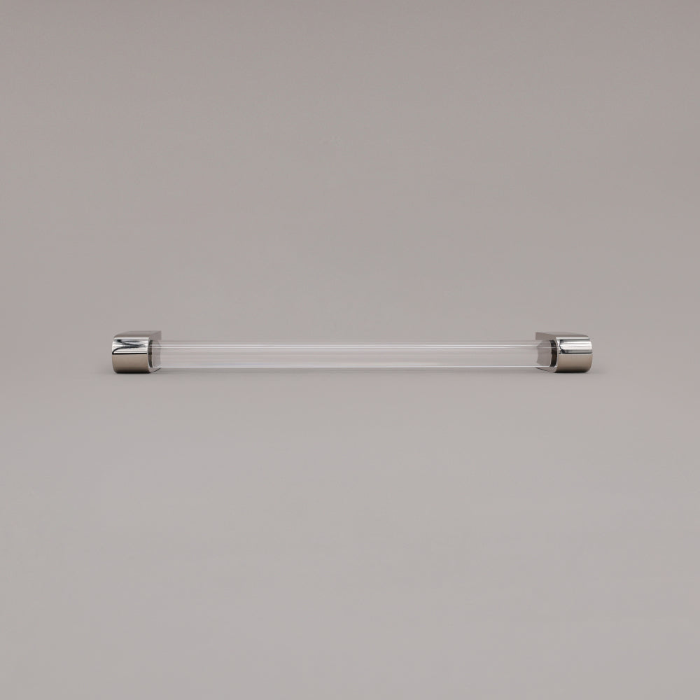 Clarity clear acrylic and polished nickel stems 12 inch appliance pull laying on gray background