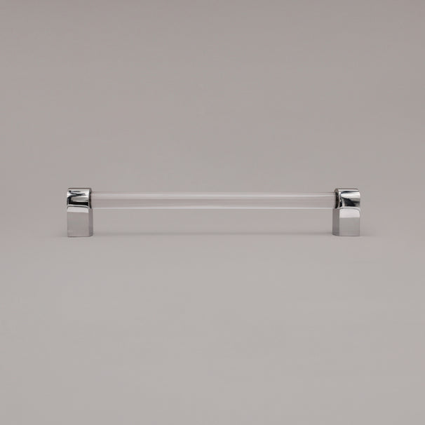 Clarity clear acrylic and polished nickel stems 12 inch appliance pull standing on gray background