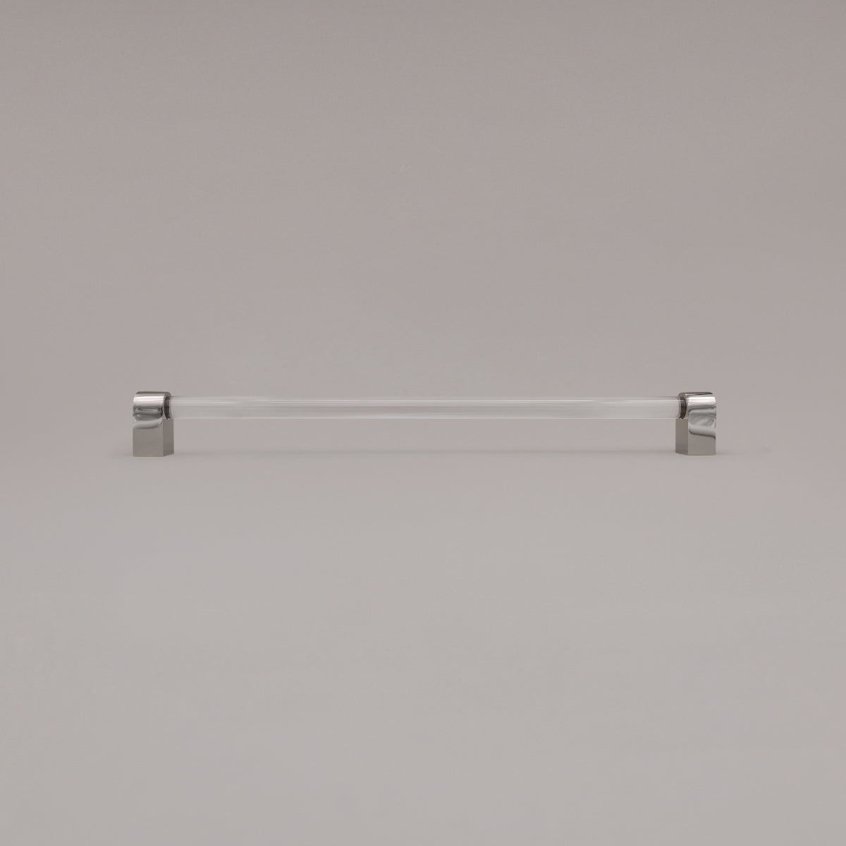Clarity clear acrylic and polished nickel stems 18 inch appliance pull standing on gray background