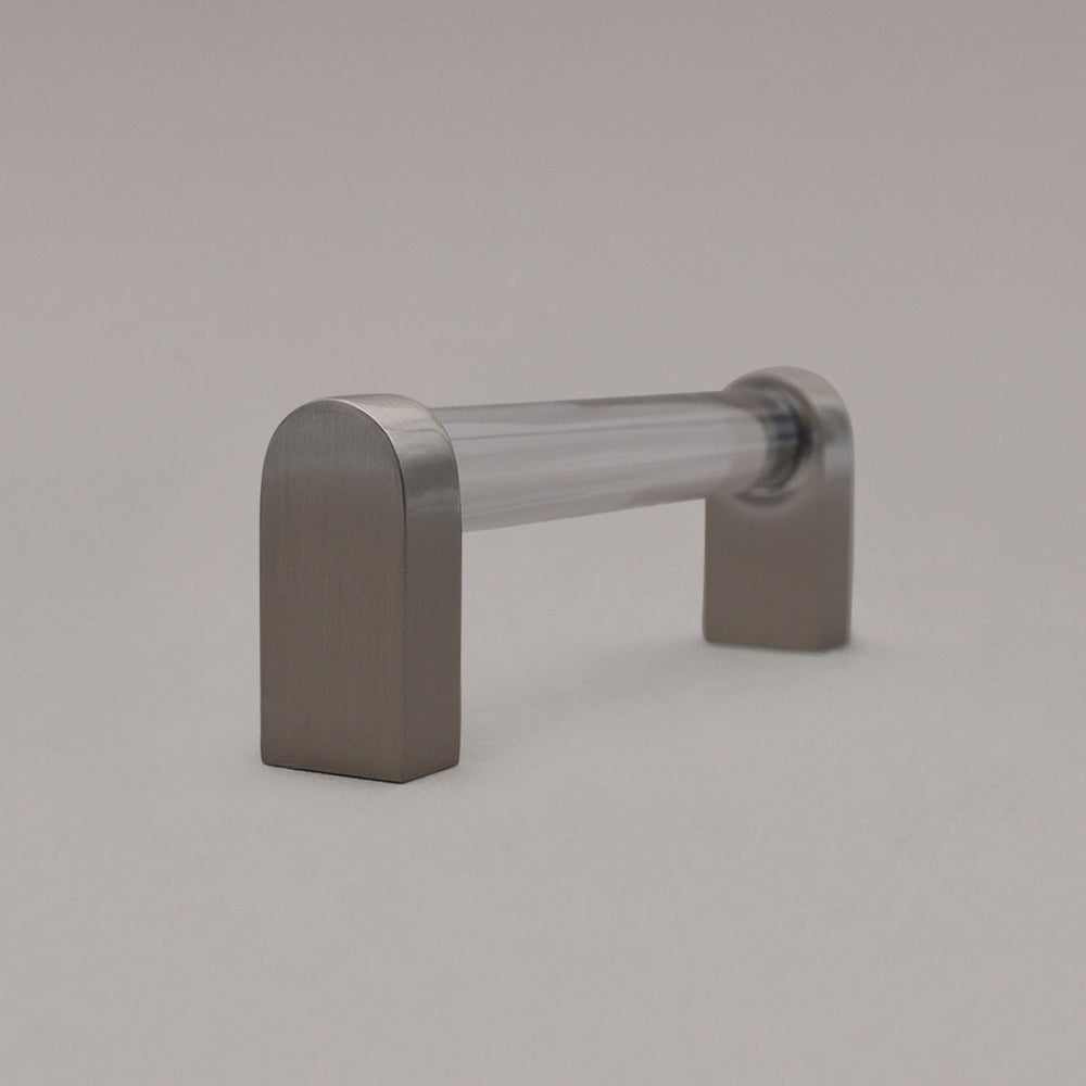 small clear and satin nickel cabinet pull side view standing on gray background