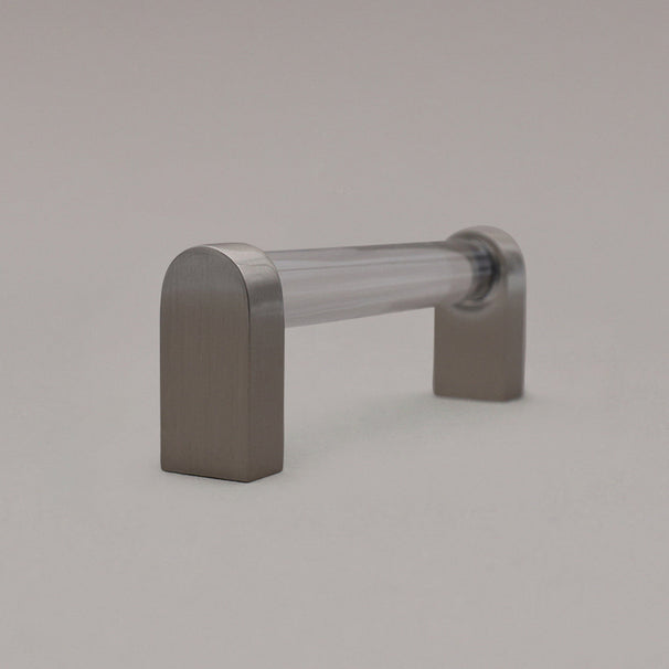 small clear and satin nickel cabinet pull side view standing on gray background