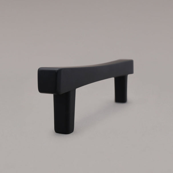Black Diamond cabinet pull standing on gray background side view