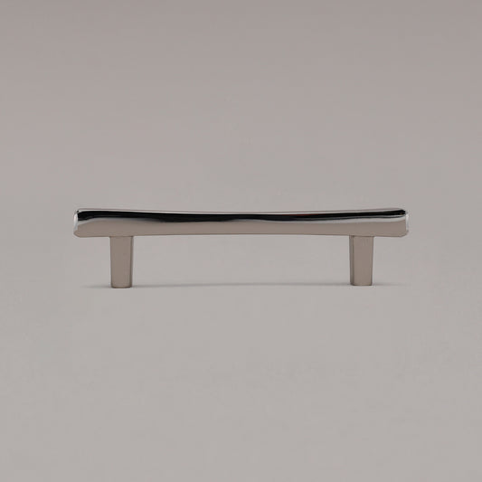 Black diamond cabinet pull standing on gray background