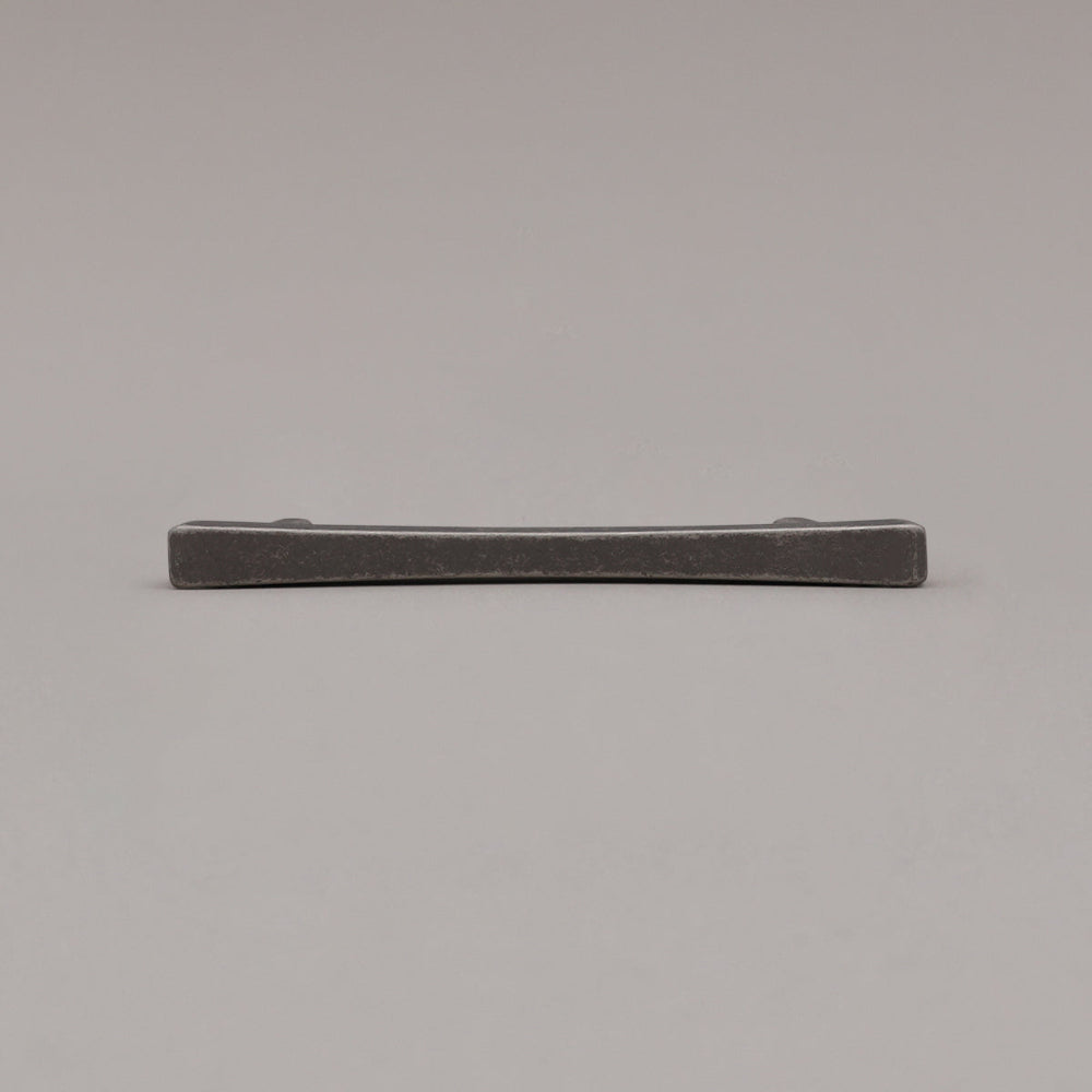 weathered nickel diamond pull laying down on gray background