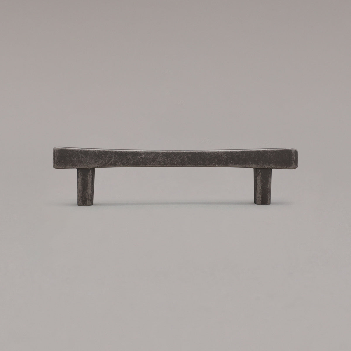 weathered nickel diamond cabinet pull standing on gray background