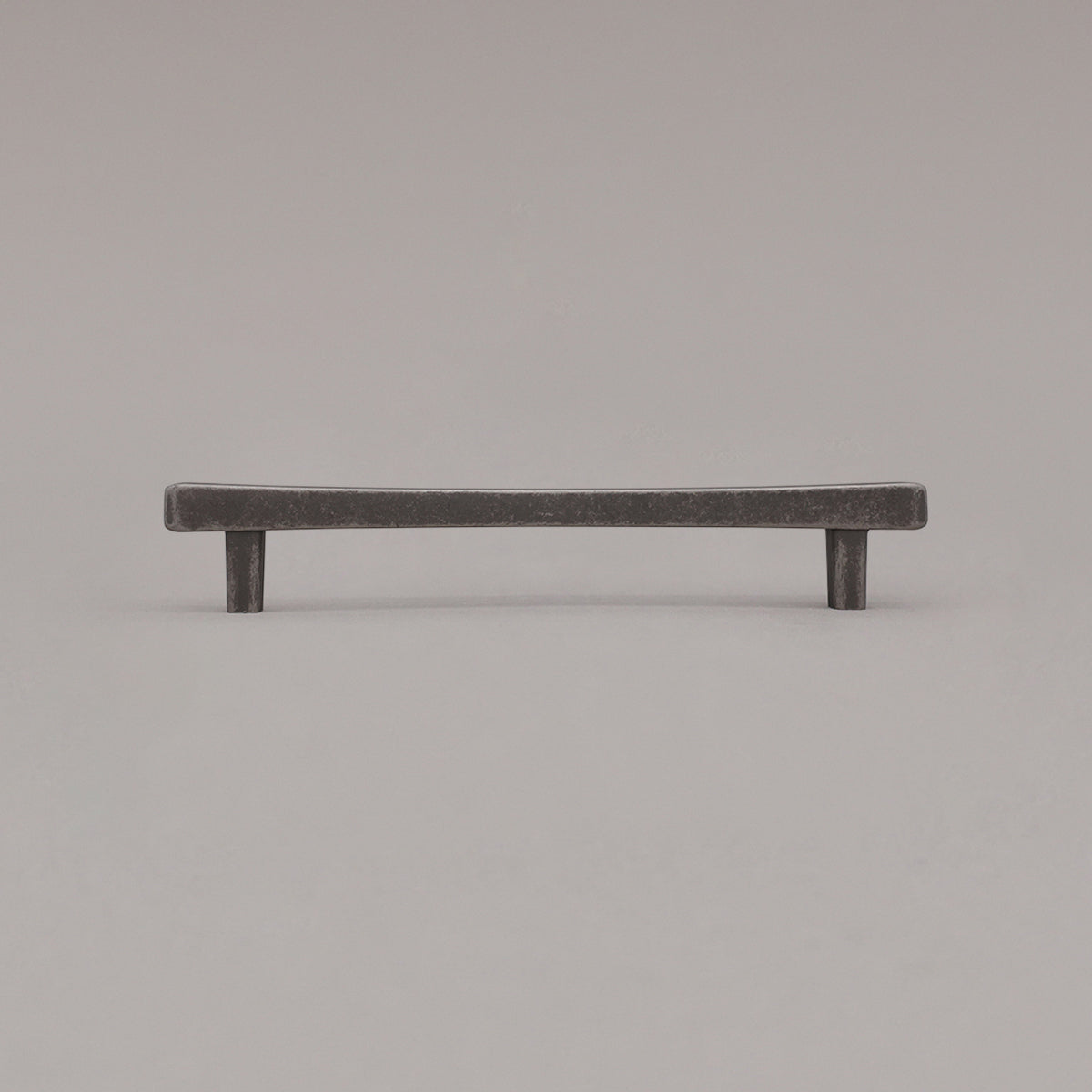 Medium weathered nickel diamond cabinet pull standing on gray background