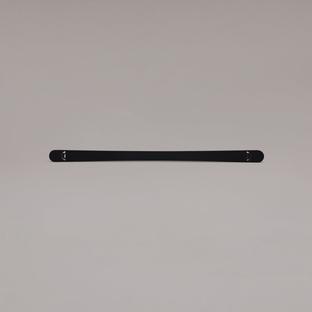 18" Horizon appliance pull in Matte Black laying on gray background