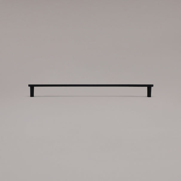 18" Horizon appliance pull in Matte Black standing on gray background