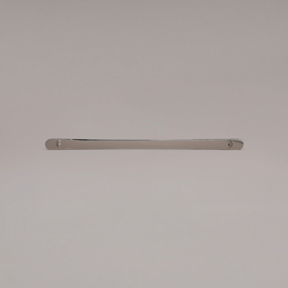 18" Horizon appliance pull in Polished Nickel laying on gray background