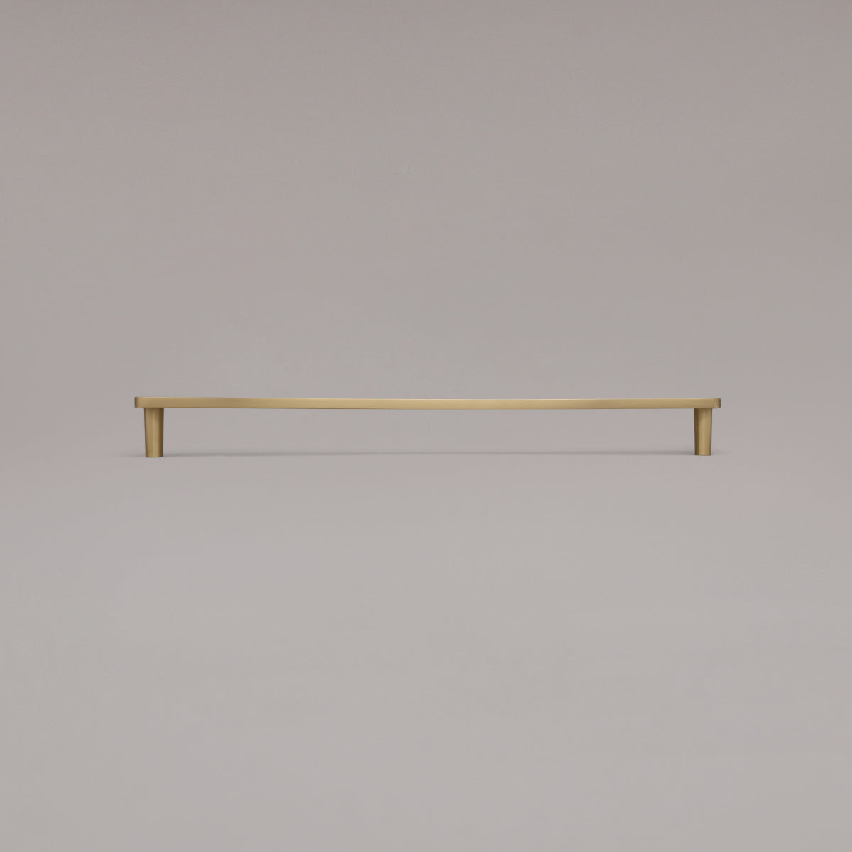 18" Horizon appliance pull in Satin Brass standing on gray background