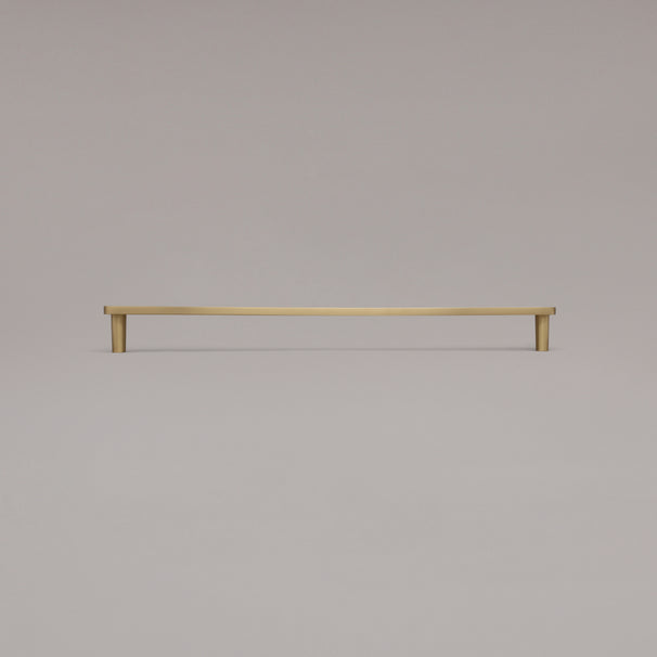 18" Horizon appliance pull in Satin Brass standing on gray background