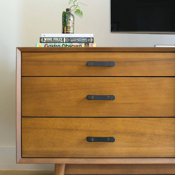 Horizon matte black pulls installed on wooden dresser