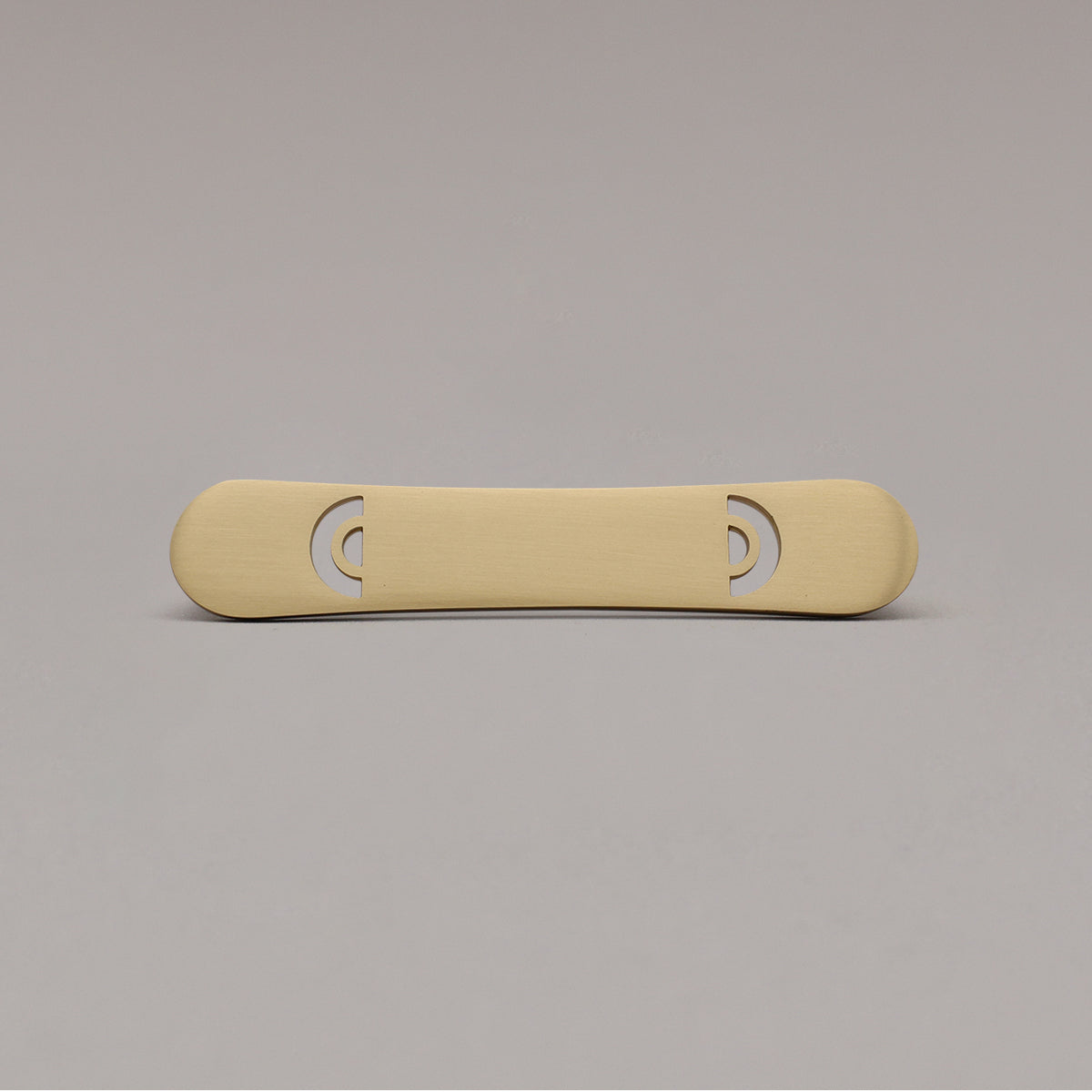 small horizon satin brass gold pull on gray background
