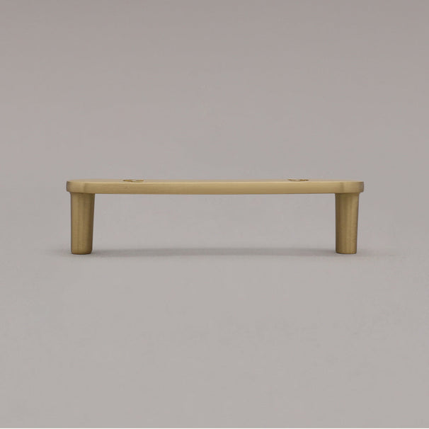 horizon satin brass gold pull standing on gray background