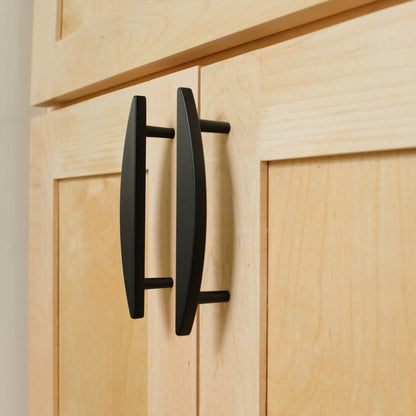 Black Half Moon Cabinet Pulls on Wood Cabinets