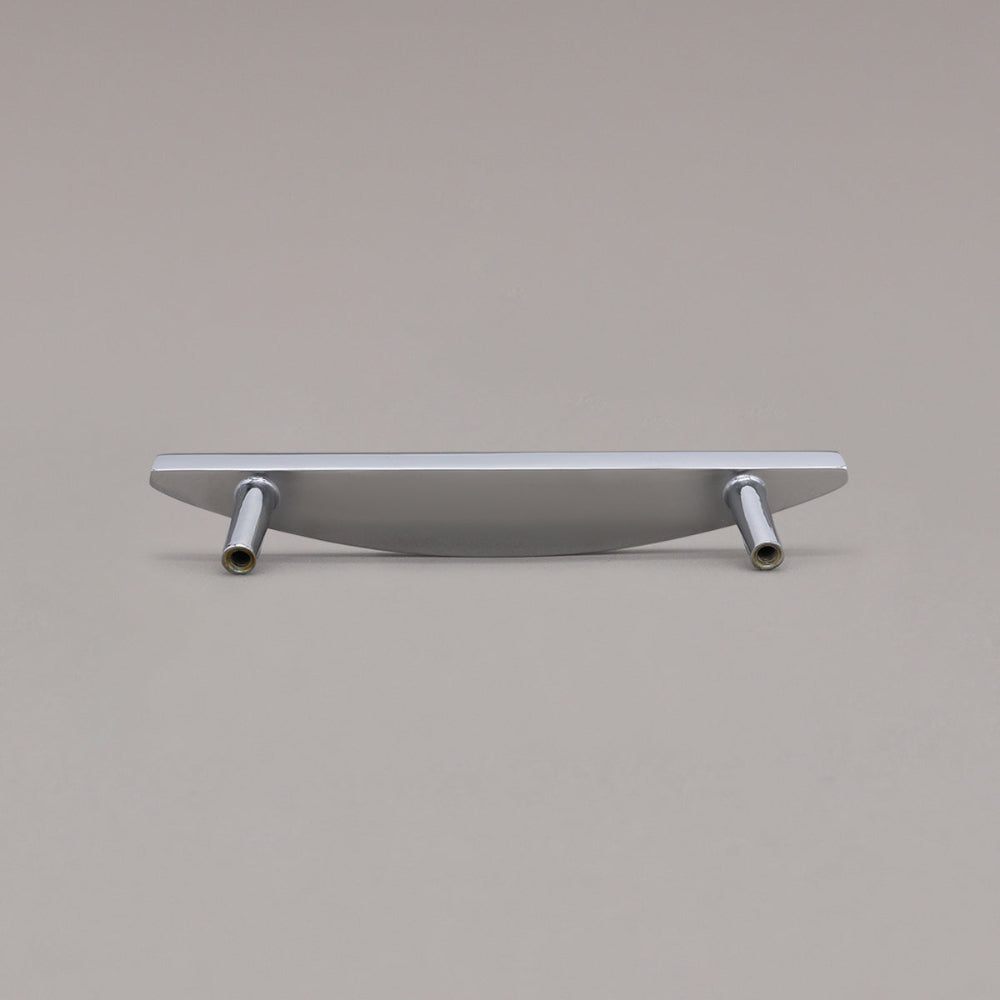 small polished chrome half moon pull rear view on gray background