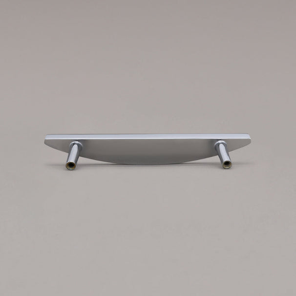 small polished chrome half moon pull rear view on gray background