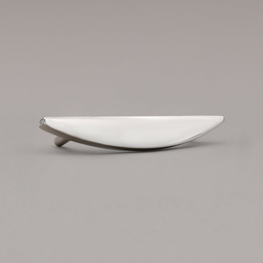 small half moon polished nickel pull angled on gray background