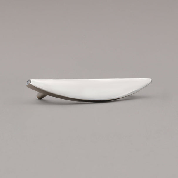 small half moon polished nickel pull angled on gray background