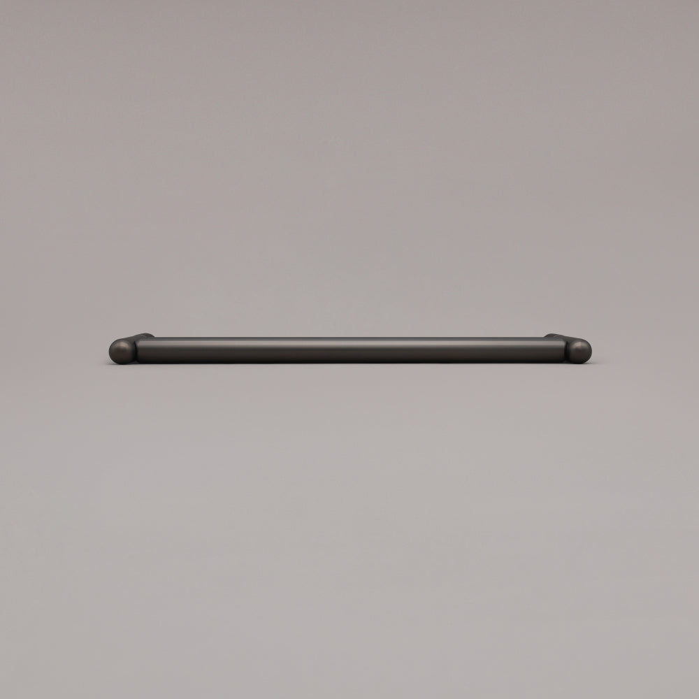 12" Knurled appliance pull in Graphite laying on gray background