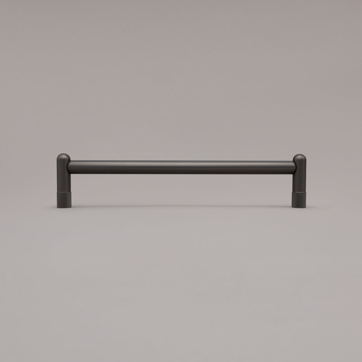 12" knurled appliance pull in graphite standing on gray background