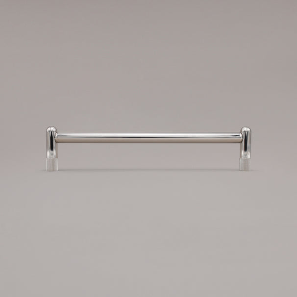 12" knurled appliance pull in polished nickel standing on gray background