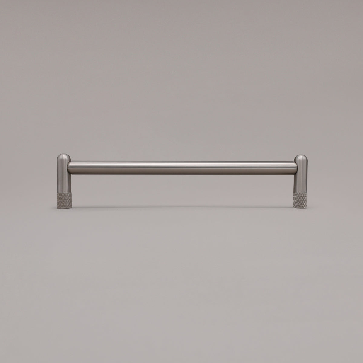 12" knurled appliance pull in satin nickel standing on gray background