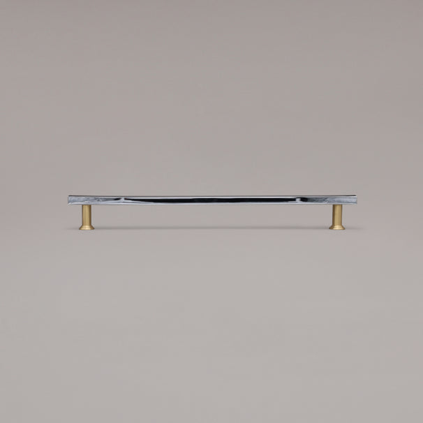 18" Mod appliance pull in Chrome and Satin Brass standing on gray background