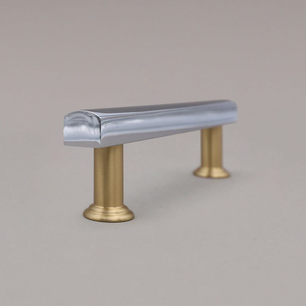 polished chrome and satin brass mod pull side view on gray background