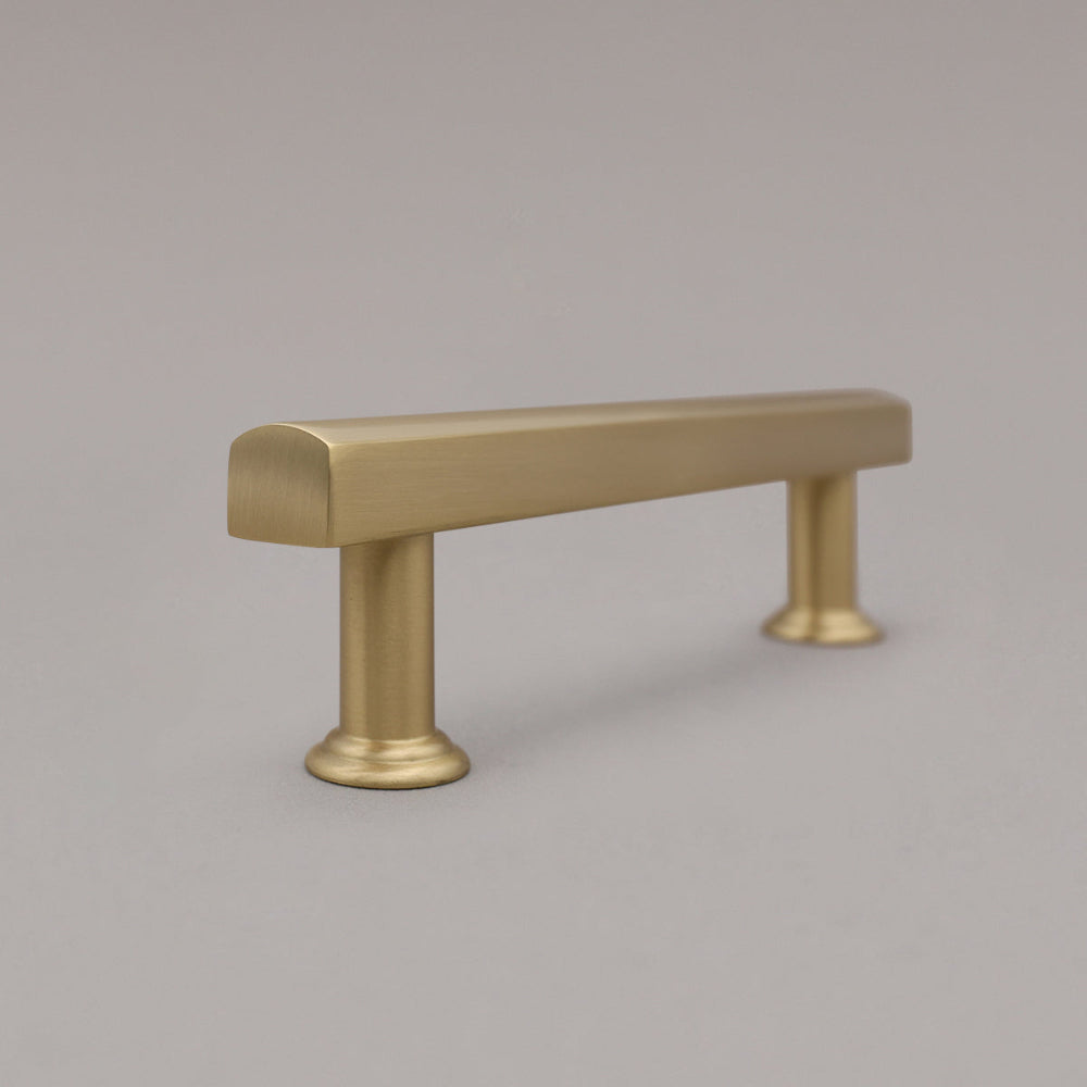 satin brass gold mod cabinet pull side view on gray background