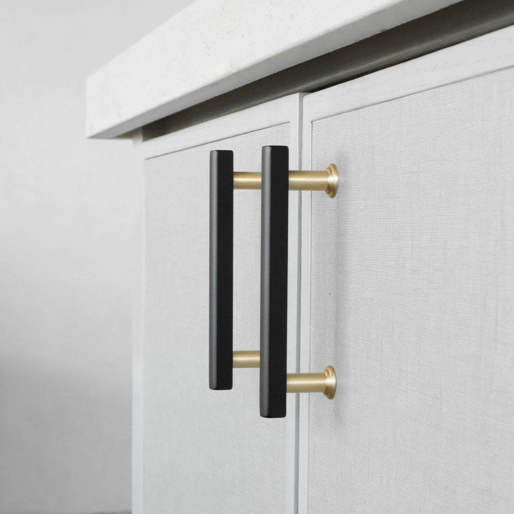 black and brass mod cabinet pulls installed on neutral cabinets