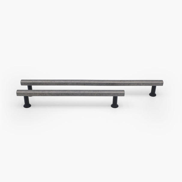 12" and 18" Mod appliance pulls in Weathered Nickel and Matte Black standing on white background