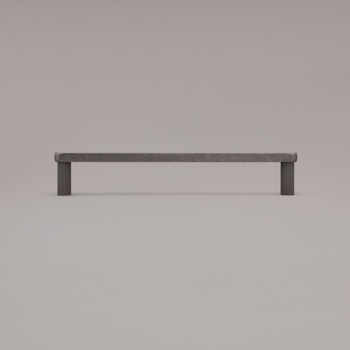 12" Ribbed appliance pull in Weathered Nickel standing on gray background