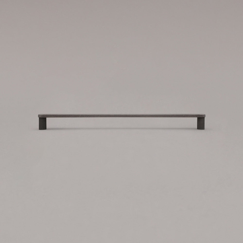 extra large ribbed weathered nickel cabinet pull standing on gray background