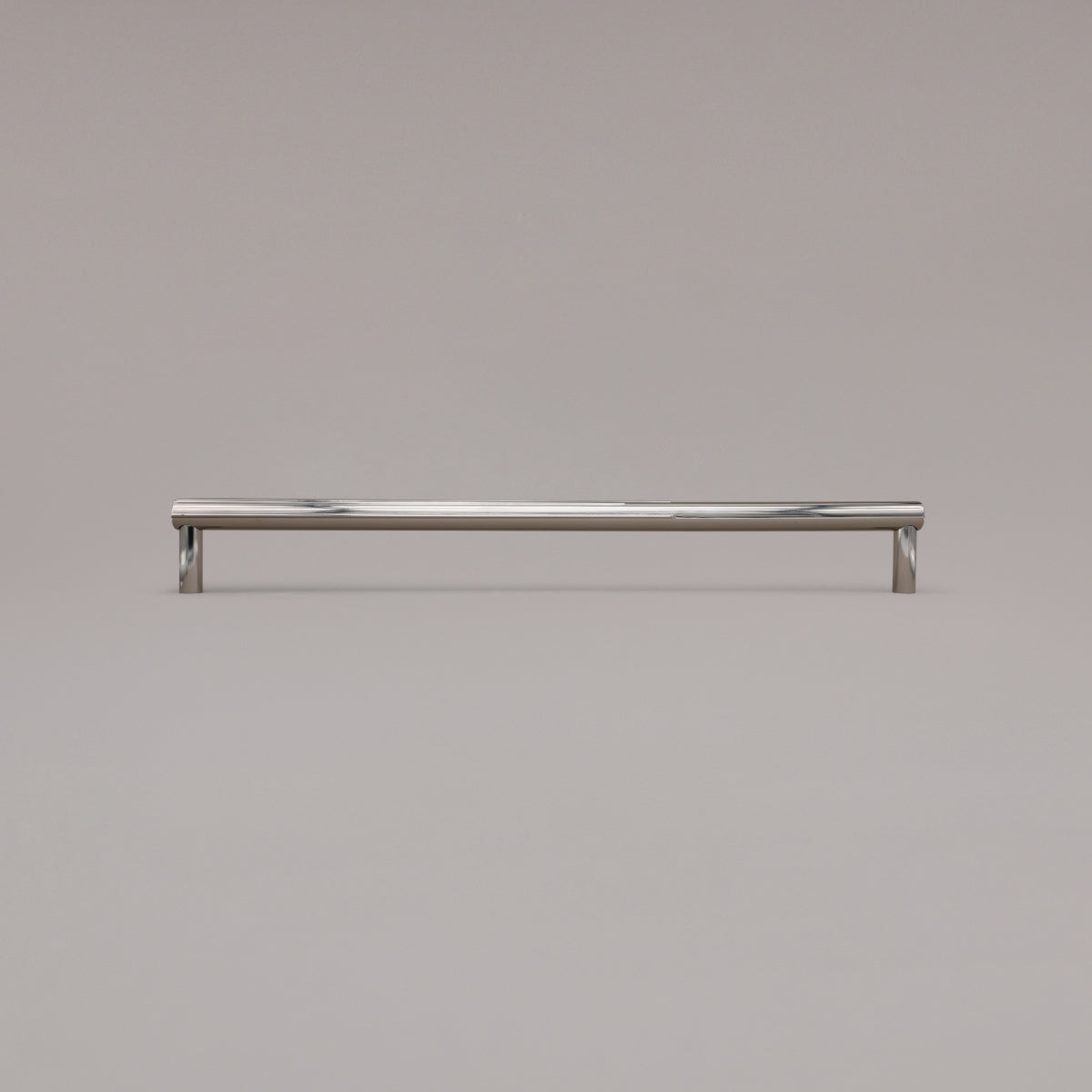 18" Sunburst appliance pull in Polished Nickel standing on gray background