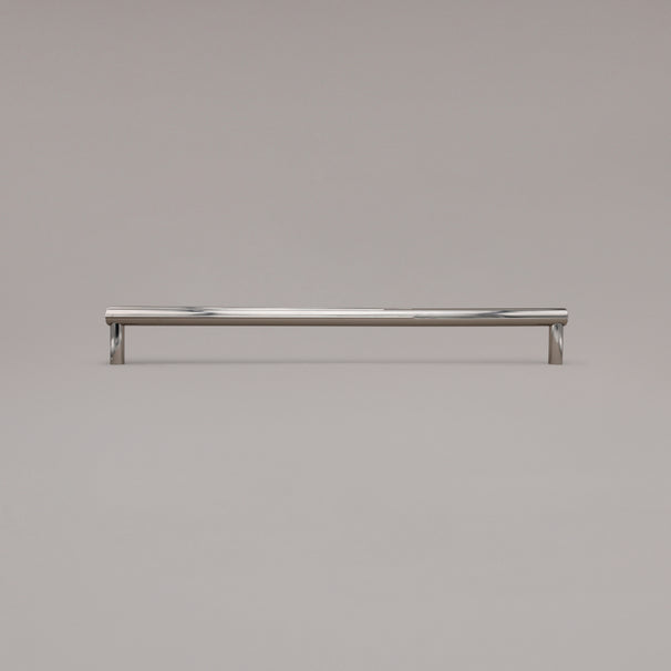 18" Sunburst appliance pull in Polished Nickel standing on gray background