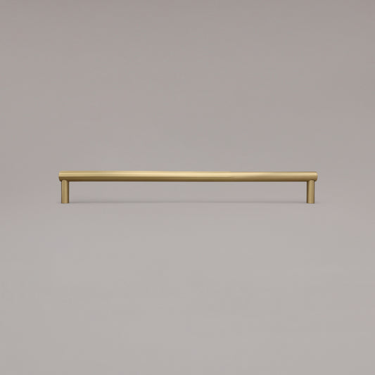 18" Sunburst appliance pull in Polished Nickel standing on gray background