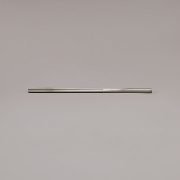 18" Sunburst appliance pull in Satin Nickel laying on gray background