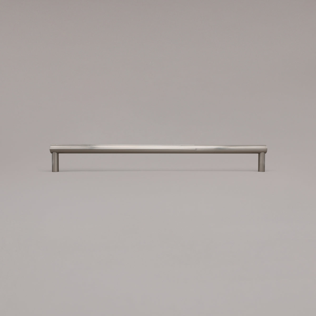 18" Sunburst appliance pull in Satin Nickel standing on gray background